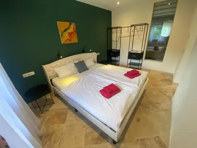 Ein Bett oder Betten in einem Zimmer der Unterkunft Ferienwohnung am Miriquidi
