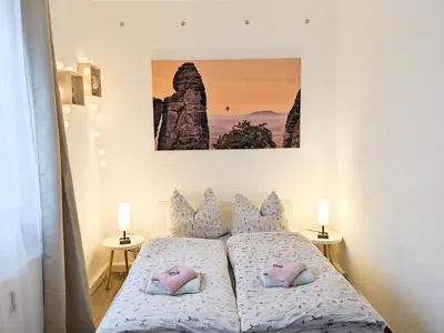 Ein Bett oder Betten in einem Zimmer der Unterkunft W6 - Gemütliche Wohnung in Lichtenhain