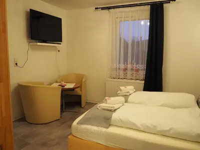 Ein Bett oder Betten in einem Zimmer der Unterkunft Piroska Pension