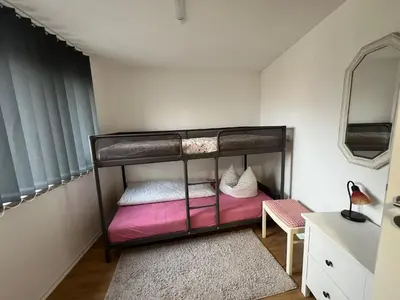Ein Bett oder Betten in einem Zimmer der Unterkunft Ferienhaus zur Kurfürstin