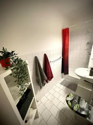 Ein Badezimmer in der Unterkunft Cozy Apartment in City Center