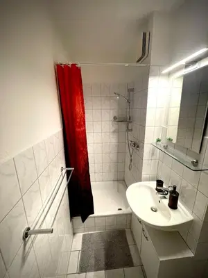 Ein Badezimmer in der Unterkunft Cozy Apartment in City Center