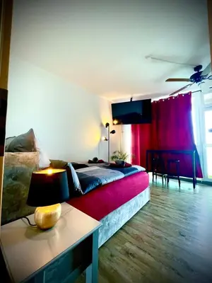 Ein Bett oder Betten in einem Zimmer der Unterkunft Cozy Apartment in City Center