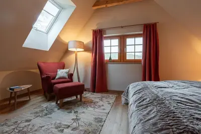Ein Bett oder Betten in einem Zimmer der Unterkunft Bio Apartments mit Saunabereich im Bio Naturidyll Wiesengrund