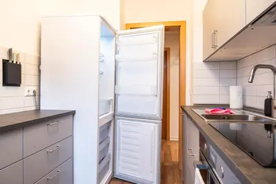 Küche/Küchenzeile in der Unterkunft Cityapartment mit großem Balkon am Stadtpark- DisneyPlus und 300mbs Internet