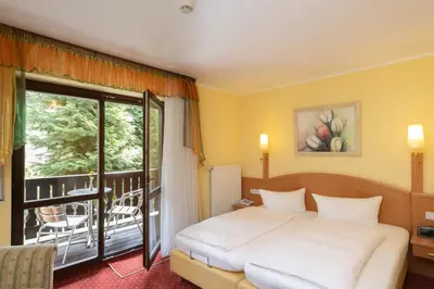 Ein Bett oder Betten in einem Zimmer der Unterkunft Hotel Elbpromenade