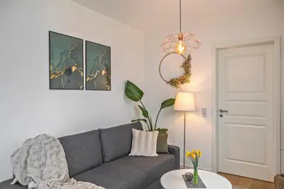 Ein Sitzbereich in der Unterkunft Stylishes Apartment für 4 mit Küche nahe Altstadt
