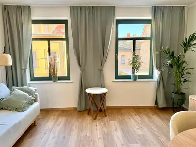 Ein Sitzbereich in der Unterkunft Stylish 2R apartment