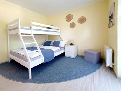 Ein Bett oder Betten in einem Zimmer der Unterkunft Grossenhain Ferien