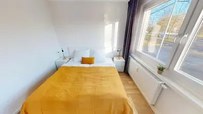 Ein Bett oder Betten in einem Zimmer der Unterkunft 2-Raum-Appartement mit Balkon, WLAN