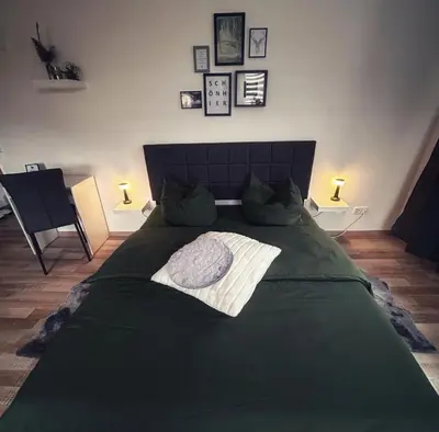 Ein Bett oder Betten in einem Zimmer der Unterkunft Quartier 3punkt0 alte Steigerbaude