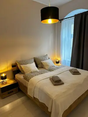 Ein Bett oder Betten in einem Zimmer der Unterkunft ElbPerle Meißen-Altstadt WLAN Parken WOHLFÜHLEN