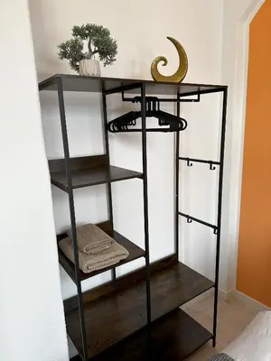 Ein Etagenbett oder Etagenbetten in einem Zimmer der Unterkunft ElbPerle Meißen-Altstadt WLAN Parken WOHLFÜHLEN
