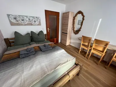 Ein Bett oder Betten in einem Zimmer der Unterkunft Cozy Apartment