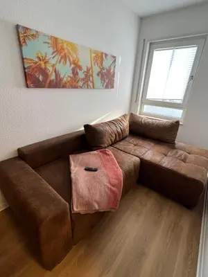 Ein Sitzbereich in der Unterkunft Cozy Apartment