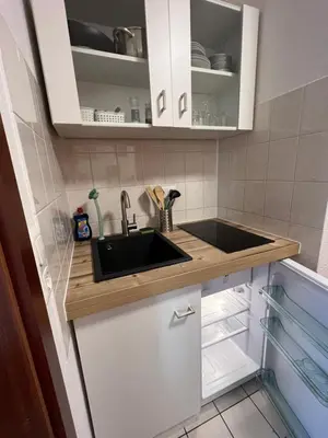 Küche/Küchenzeile in der Unterkunft Cozy Apartment