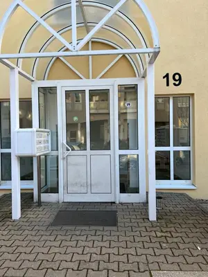 Eine Fassade oder ein Eingang zu Cozy Apartment