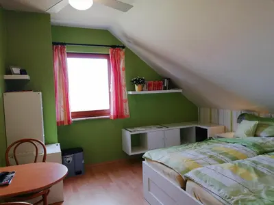 Ein Bett oder Betten in einem Zimmer der Unterkunft Privatzimmer mit Aussicht