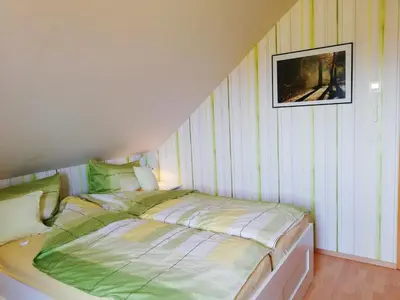 Ein Bett oder Betten in einem Zimmer der Unterkunft Privatzimmer mit Aussicht