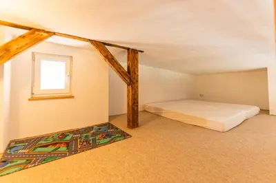 Ein Bett oder Betten in einem Zimmer der Unterkunft ElbApartments - Sächsische Schweiz - Ferienwohnungen zum Malerweg - Bastei Urlaub