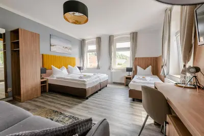 Ein Bett oder Betten in einem Zimmer der Unterkunft ElbApartments - Sächsische Schweiz - Ferienwohnungen zum Malerweg - Bastei Urlaub