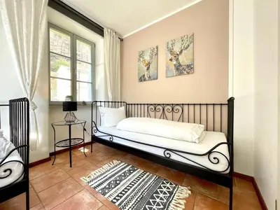 Ein Bett oder Betten in einem Zimmer der Unterkunft Villa Monsei - das Herzstück in Bad Schandau, top Lage, modern, mit Parkplatz!