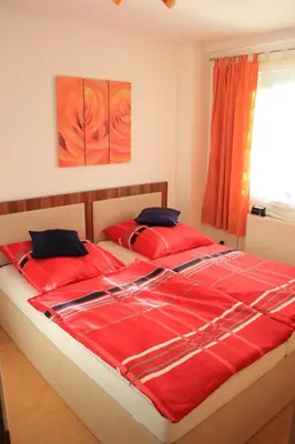 Ein Bett oder Betten in einem Zimmer der Unterkunft Ferienwohnung Athena