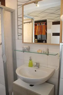 Ein Badezimmer in der Unterkunft Ferienwohnung Athena