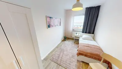 Ein Bett oder Betten in einem Zimmer der Unterkunft Modernes 3-Raum-Appartement, WLAN
