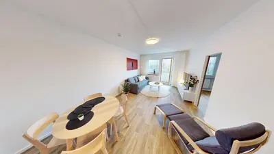 Ein Sitzbereich in der Unterkunft Modernes 3-Raum-Appartement, WLAN