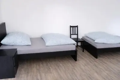 Ein Bett oder Betten in einem Zimmer der Unterkunft Monteurwohnungen in Chemnitz