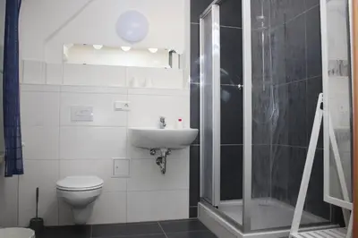Ein Badezimmer in der Unterkunft Bahnhotel Dippoldiswalde