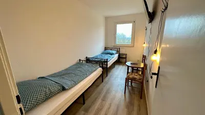 Ein Bett oder Betten in einem Zimmer der Unterkunft MiCasa TuCasa - 3-R Apartment Leipziger Neuseenland Nova