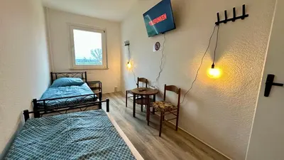 Ein Bett oder Betten in einem Zimmer der Unterkunft MiCasa TuCasa - 3-R Apartment Leipziger Neuseenland Nova