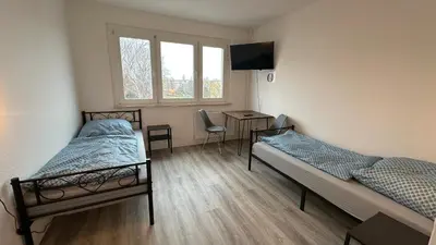 Ein Bett oder Betten in einem Zimmer der Unterkunft MiCasa TuCasa - 3-R Apartment Leipziger Neuseenland Nova