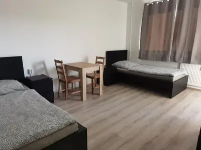 Ein Bett oder Betten in einem Zimmer der Unterkunft 2 Bett Monteurwohnung in Zeithain