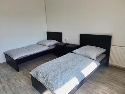 Ein Bett oder Betten in einem Zimmer der Unterkunft 4 Bett Monteurwohnung in Zeithain