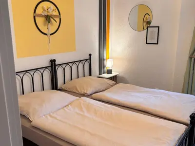 Ein Bett oder Betten in einem Zimmer der Unterkunft Ferienwohnung Elbflair