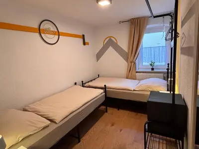 Ein Bett oder Betten in einem Zimmer der Unterkunft Ferienwohnung Elbflair