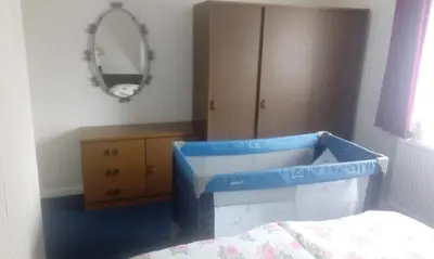 Ein Bett oder Betten in einem Zimmer der Unterkunft Ferienwohnung Rumrich