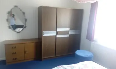 Ein Bett oder Betten in einem Zimmer der Unterkunft Ferienwohnung Rumrich