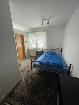 Ein Bett oder Betten in einem Zimmer der Unterkunft Monteurunterkunft nahe Dresden