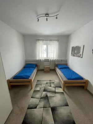 Ein Bett oder Betten in einem Zimmer der Unterkunft Monteurunterkunft nahe Dresden