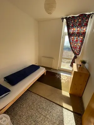 Ein Bett oder Betten in einem Zimmer der Unterkunft Monteurunterkunft nahe Dresden