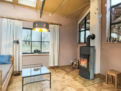 Ein Sitzbereich in der Unterkunft Chalet Glamping in der Orangerie by Interhome
