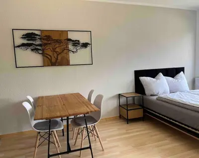 Ein Bett oder Betten in einem Zimmer der Unterkunft Modernes Apartment in der Nähe zur Uniklinik Dresden