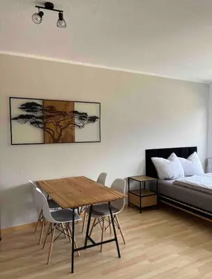 Ein Bett oder Betten in einem Zimmer der Unterkunft Modernes Apartment in der Nähe zur Uniklinik Dresden