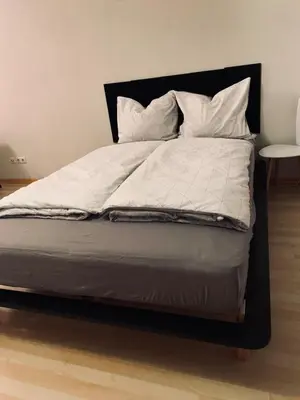 Ein Bett oder Betten in einem Zimmer der Unterkunft Modernes Apartment in der Nähe zur Uniklinik Dresden
