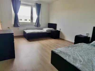 Ein Bett oder Betten in einem Zimmer der Unterkunft 5 Betten Monteurwohnung in Zeithain