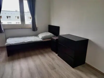 Ein Bett oder Betten in einem Zimmer der Unterkunft 5 Betten Monteurwohnung in Zeithain